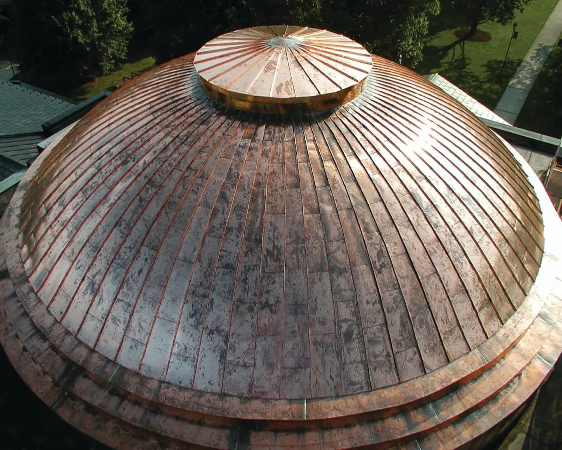 Craftsman Roofing crew installing a new roof in Clifton Park